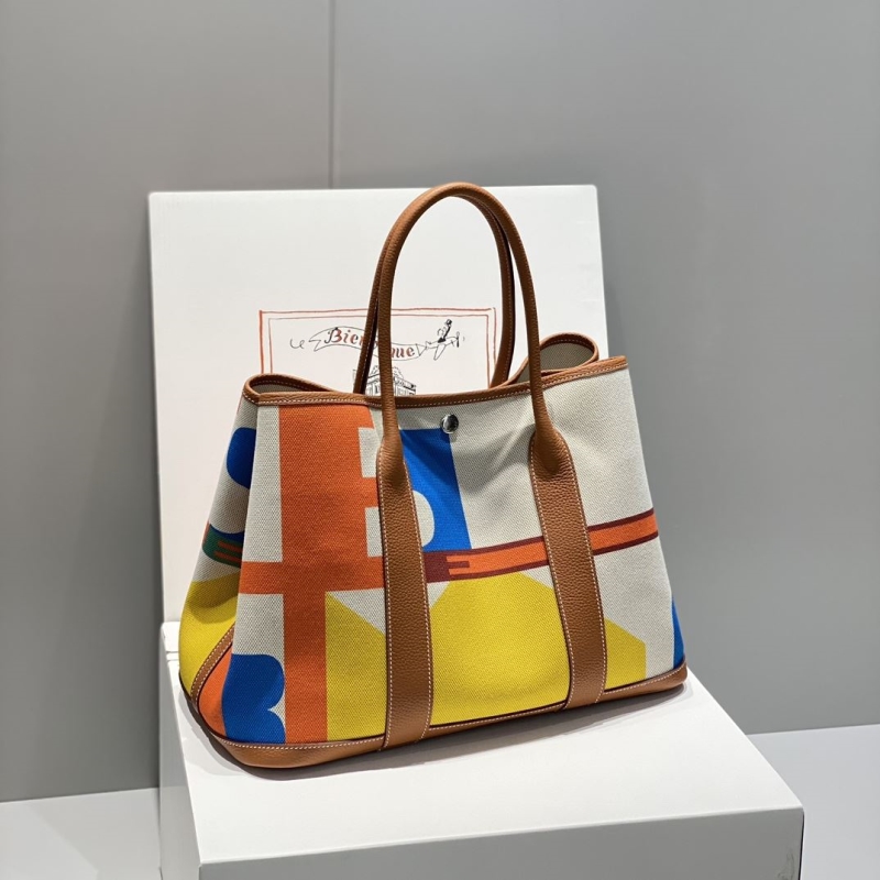 H**mes shopping bags